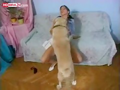 Horny brunette girl fucks dog in the soft sofa for amateur porn animal HD
