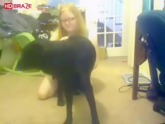 Horny babe in green dress gets orgasm with dog porn