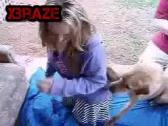 Blone bitch fucks dog hardly outsie