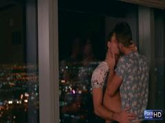 Sexy gay couple having fun in hotel room