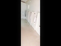 Risky wank in public bathroom