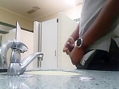 Black perv caught jerking in restroom