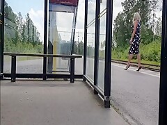 HannaTransa Chastity Crossdresser outdoors at train station.
