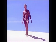 Tanned guy on beach in tiny string thong (temporarily!)