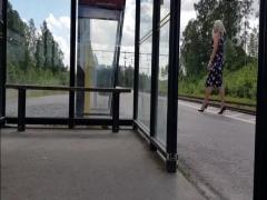 HannaTransa Chastity Crossdresser outdoors at train station.