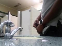 Black perv caught jerking in restroom